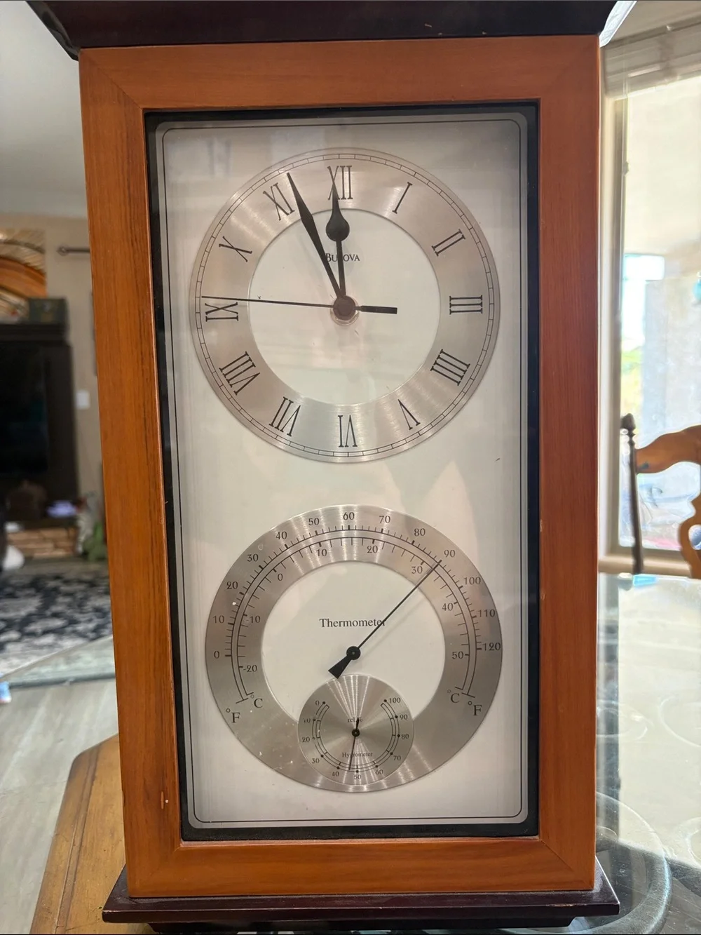 Bulova C3760 Wood-Frame Wall Clock in Brown and Silver